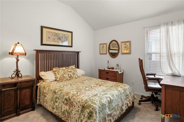 128 Riverhill Dr, Georgetown, TX 78628 - bedroom featuring light colored carpet, lofted ceiling, and a desk