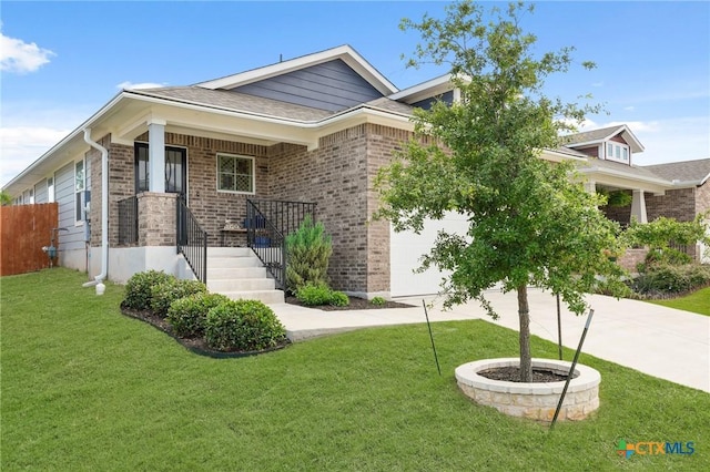 128 Riverhill Dr, Georgetown, TX 78628 - view of front of house with a garage and brick siding