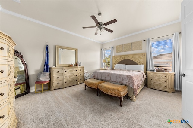 bedroom featuring multiple windows, light colored carpet, and ceiling fan