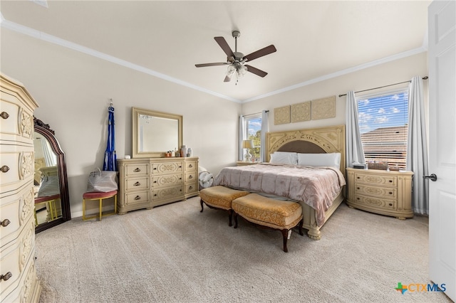 bedroom featuring multiple windows, light carpet, and ceiling fan