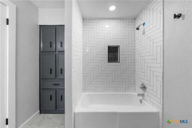 bathroom with shower / tub combination