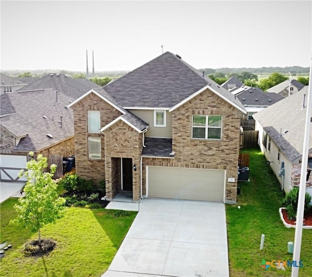2241 Windswept Wy Way, New Braunfels, TX 78132 - traditional-style home featuring an attached garage, driveway, roof with shingles, and brick siding