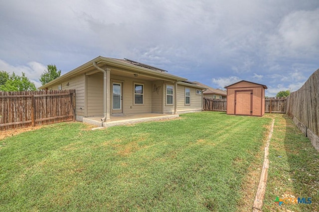 2588 Diamondback Trl, New Braunfels, TX 78130 - back of property with a patio area, a shed, and a fenced backyard