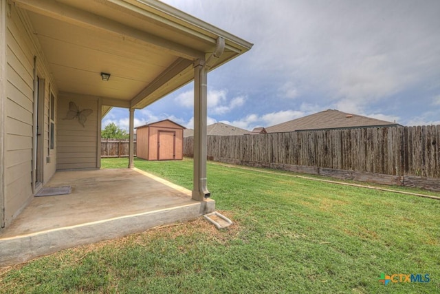 2588 Diamondback Trl, New Braunfels, TX 78130 - fenced backyard featuring a storage shed and a patio