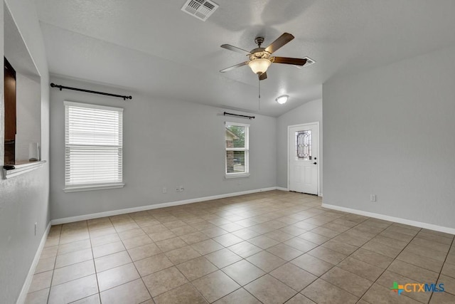 2588 Diamondback Trl, New Braunfels, TX 78130 - empty room featuring ceiling fan, tile patterned flooring, and lofted ceiling