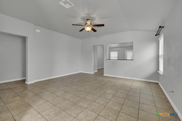 2588 Diamondback Trl, New Braunfels, TX 78130 - empty room with a ceiling fan, tile patterned floors, and lofted ceiling