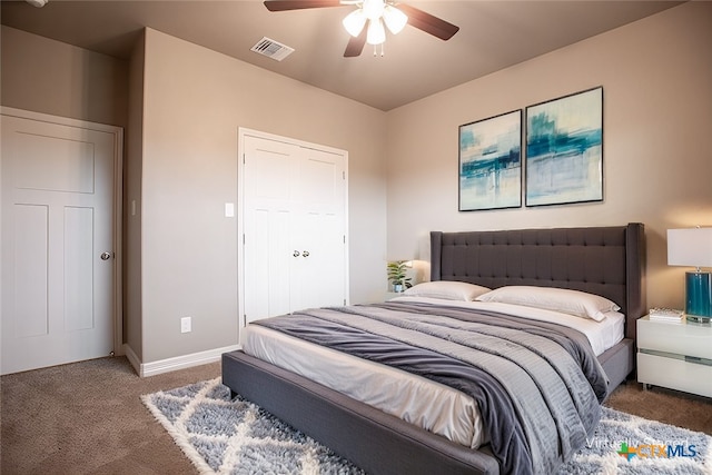 carpeted bedroom with ceiling fan