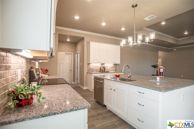 kitchen featuring an island with sink, stainless steel dishwasher, white cabinets, and sink