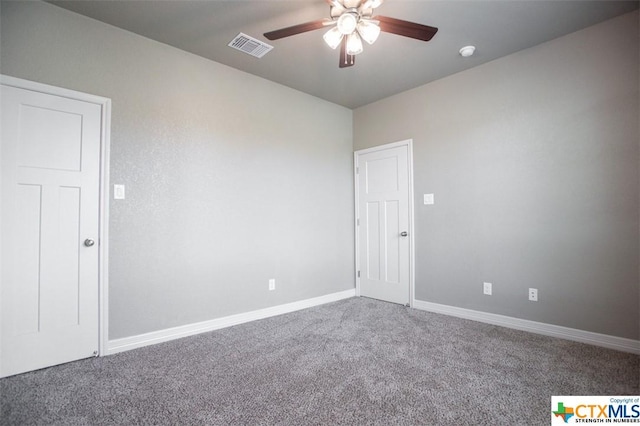 1027 Winchester Dr, Nolanville, TX 76559 - carpeted spare room featuring ceiling fan, baseboards, and a smoke detector