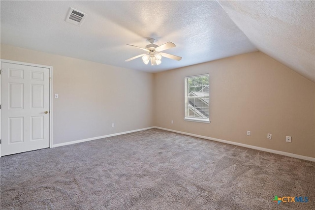 2109 Grizzly Trl, Harker Heights, TX 76548 - additional living space featuring carpet floors, ceiling fan, lofted ceiling, baseboards, and a textured ceiling