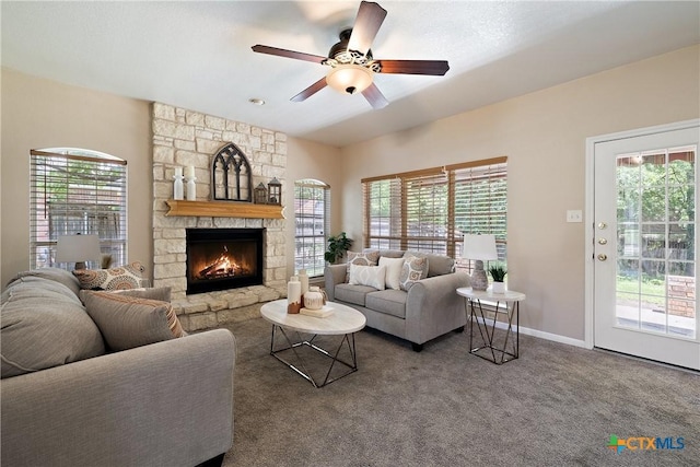 2109 Grizzly Trl, Harker Heights, TX 76548 - carpeted living area with a fireplace, healthy amount of natural light, and a ceiling fan