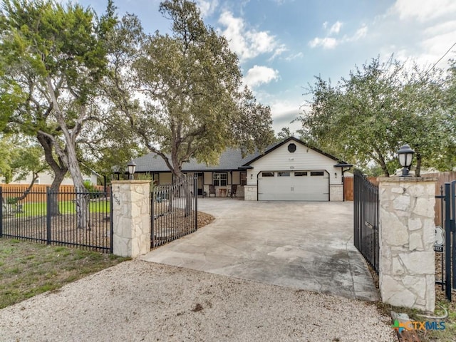 view of front of property featuring a garage