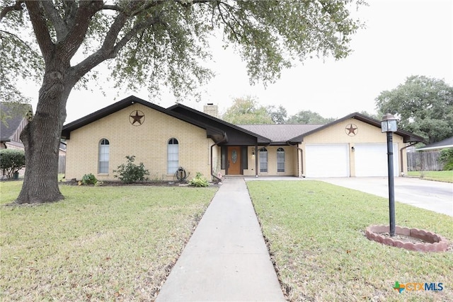 ranch-style house with a garage and a front lawn