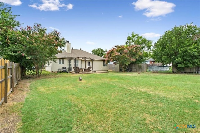 8620 Sunset Trl, Temple, TX 76502 - fenced backyard featuring a patio area