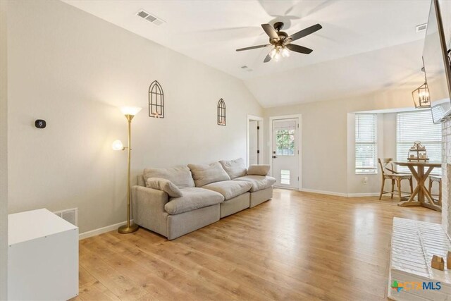 8620 Sunset Trl, Temple, TX 76502 - living room with light wood-style flooring, a ceiling fan, and lofted ceiling