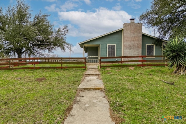 exterior space with a yard