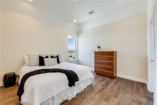 bedroom featuring hardwood / wood-style flooring