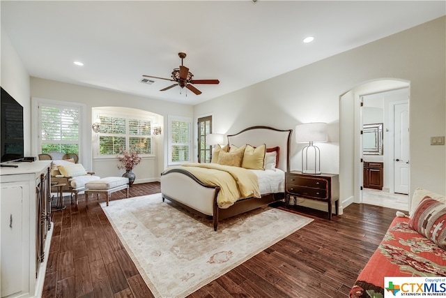 bedroom featuring dark hardwood / wood-style floors and ceiling fan