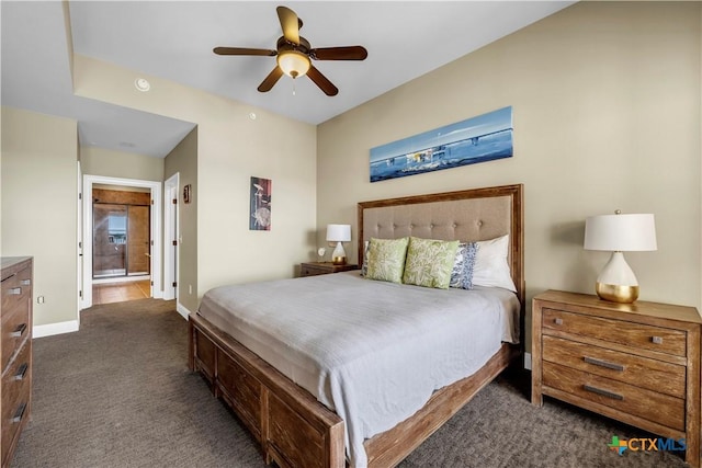 carpeted bedroom featuring ceiling fan and connected bathroom