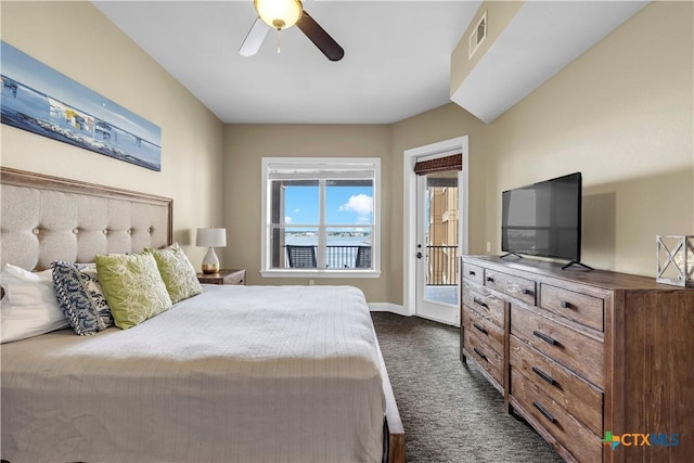 bedroom featuring access to exterior, dark carpet, and ceiling fan