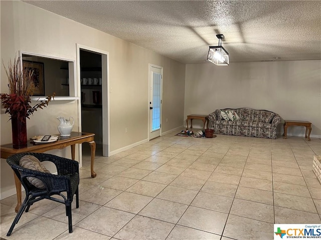 interior space featuring a textured ceiling