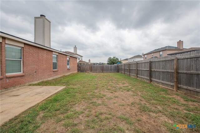 view of yard with a patio area