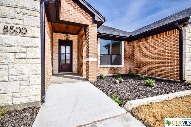 8500 Kasen Ave, Killeen, TX 76542 - entrance to property with brick siding, stone siding, and roof with shingles