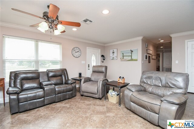 living room with ceiling fan and ornamental molding