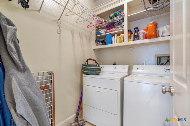 laundry area with washer and clothes dryer