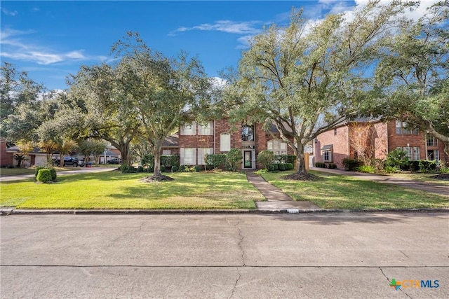 view of front of house with a front lawn