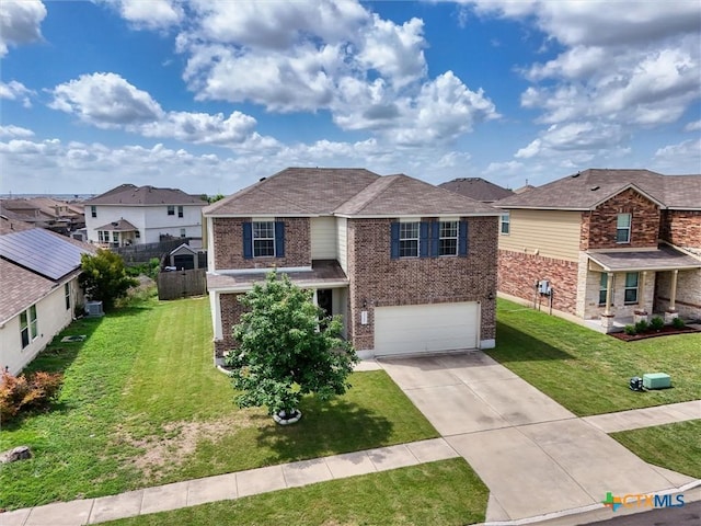 3312 Shawlands Rd, Killeen, TX 76542 - traditional-style home with brick siding, concrete driveway, an attached garage, and a residential view