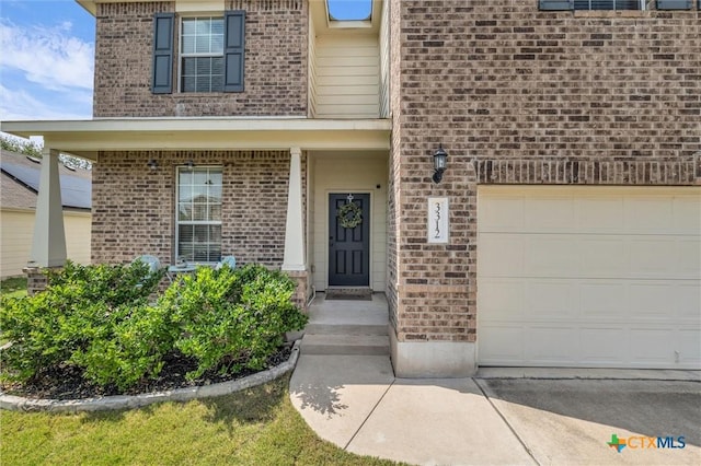 3312 Shawlands Rd, Killeen, TX 76542 - doorway to property featuring brick siding and driveway