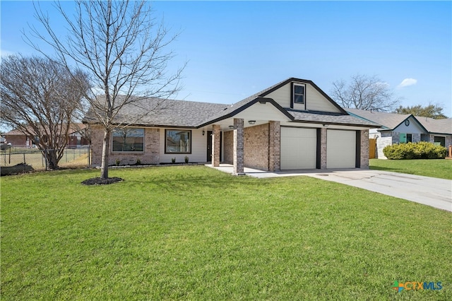 single story home with driveway, a front lawn, fence, and brick siding