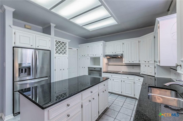 kitchen featuring a sink, black appliances, under cabinet range hood, white cabinetry, and crown molding