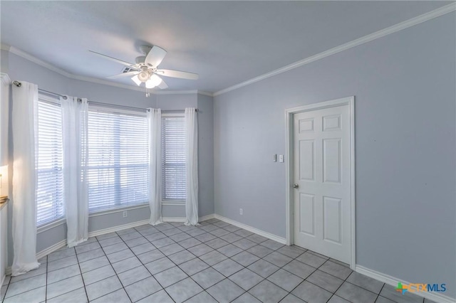 unfurnished room featuring baseboards, ornamental molding, and a ceiling fan