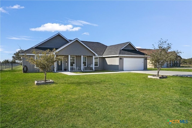 view of front of property with driveway, a porch, a front lawn, a garage, and board and batten siding