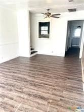 spare room with dark hardwood / wood-style floors