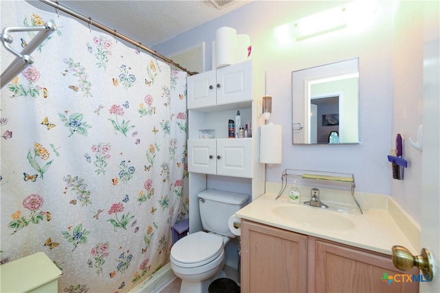 bathroom with vanity, a textured ceiling, toilet, and a shower with shower curtain