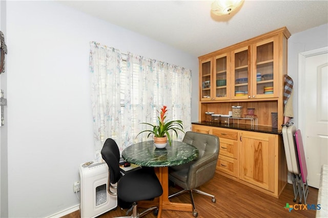 dining space featuring light wood-type flooring