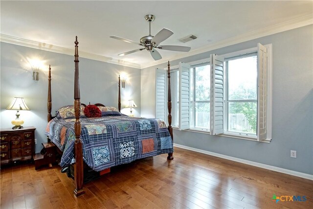 1320 Becca Teal Pl, Round Rock, TX 78681 - bedroom featuring crown molding, wood finished floors, and baseboards