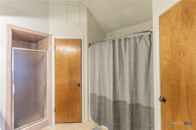 204 Paula St, Copperas Cove, TX 76522 - bathroom with lofted ceiling and a stall shower