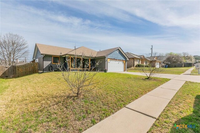 204 Paula St, Copperas Cove, TX 76522 - ranch-style home featuring driveway, fence, a front yard, an attached garage, and brick siding