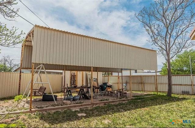 exterior space featuring a fenced backyard