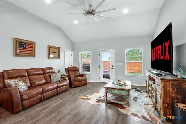 living room with lofted ceiling, recessed lighting, baseboards, ceiling fan, and wood finished floors
