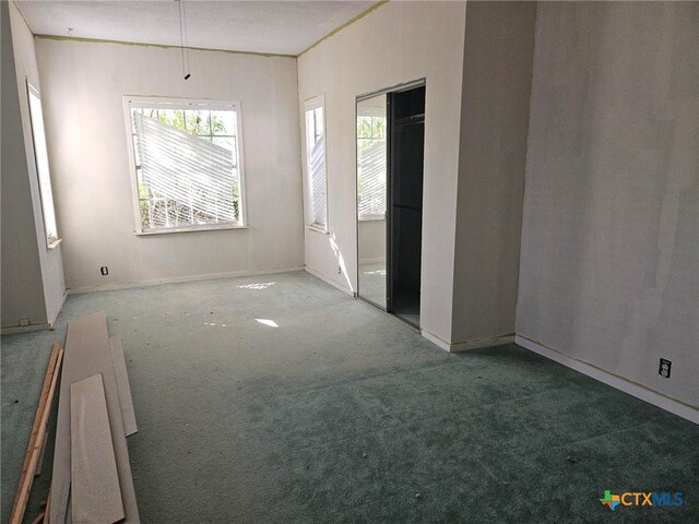 view of carpeted empty room