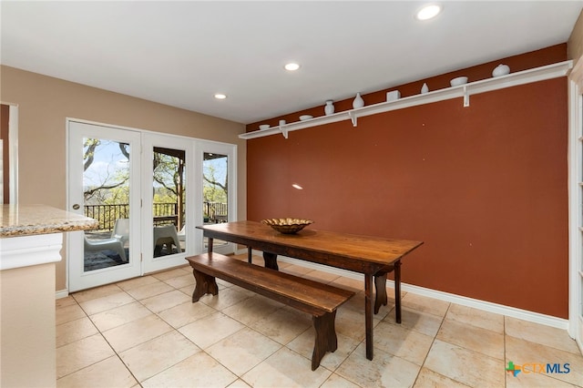 dining room featuring light tile patterned flooring, recessed lighting, and baseboards