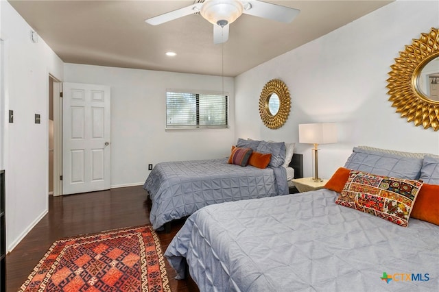 bedroom featuring recessed lighting, wood finished floors, baseboards, and ceiling fan