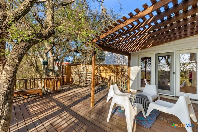 wooden terrace with fence and a pergola