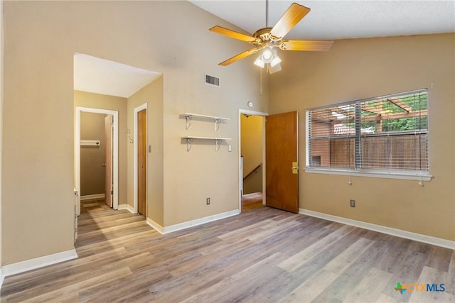 821 Old Ranch Road 12, San Marcos, TX 78666 - unfurnished bedroom with baseboards, visible vents, ceiling fan, and light wood finished floors