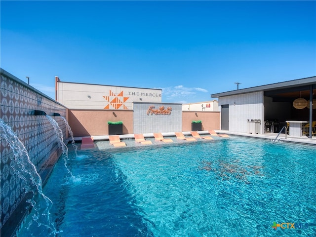 view of pool featuring a fenced in pool